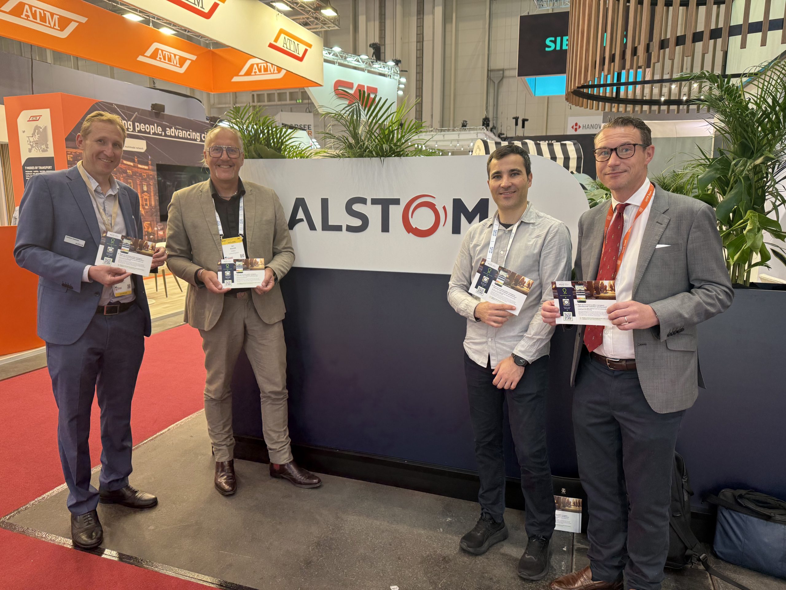 Jim Walker and Dr Carlos Canas from Walk21 with Warwick Townsend  from Alstom and Philip Turner from UITP at the Hamburg congress.  
